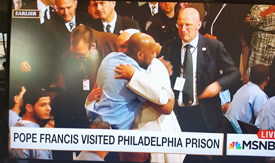 Pope Francis hugging inmate at Curran-Fromhold Correctional Facility